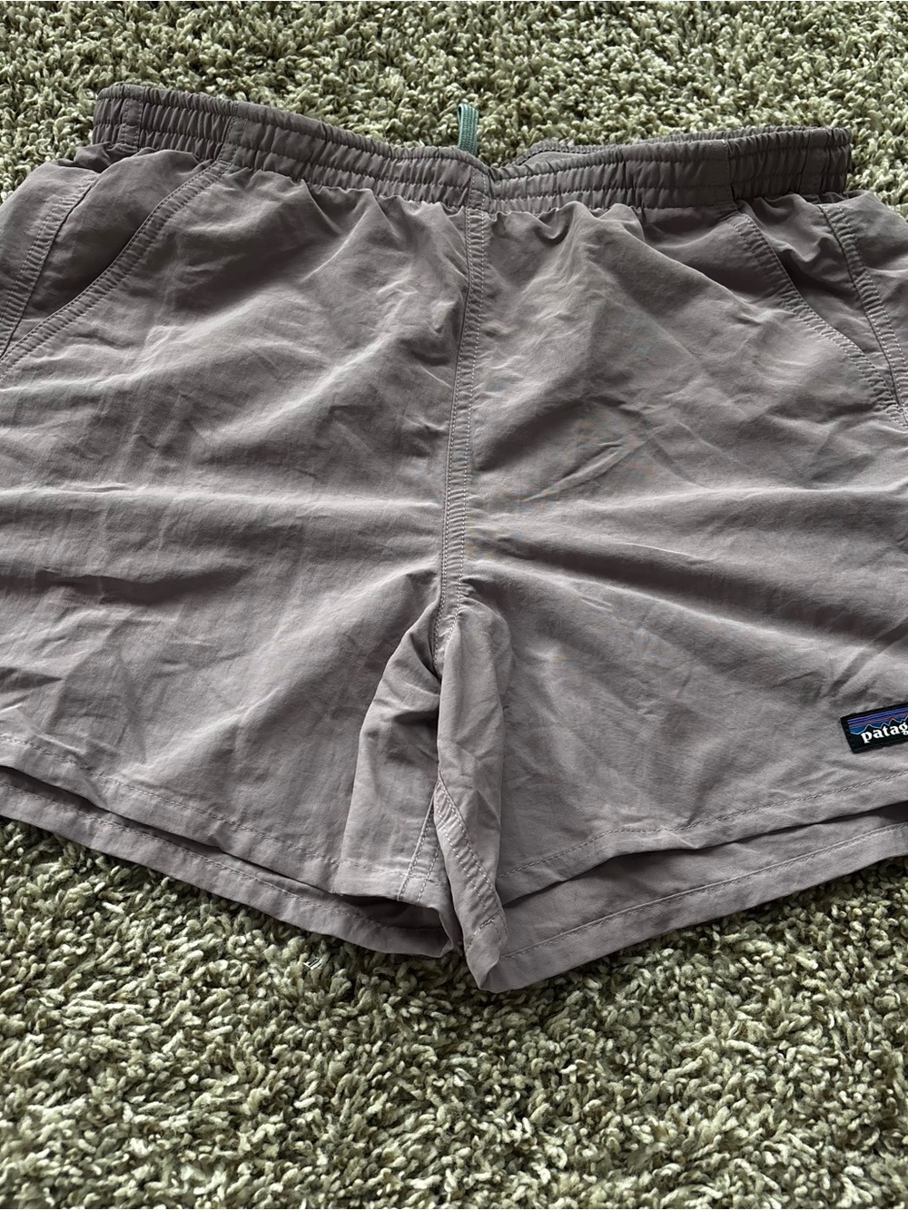 Patagonia beige shorts with multicolor logo